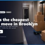 Elevator lobby scene in Brooklyn with stacked moving boxes and a dolly, illustrating preparation for a move. The image highlights a modern, clean environment suitable for moving activities.